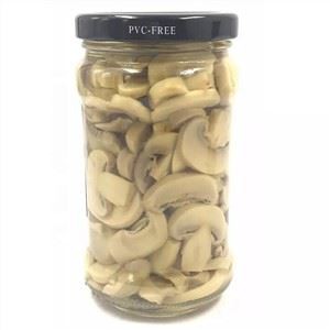 Peces i tiges de bolets en pot de vidre